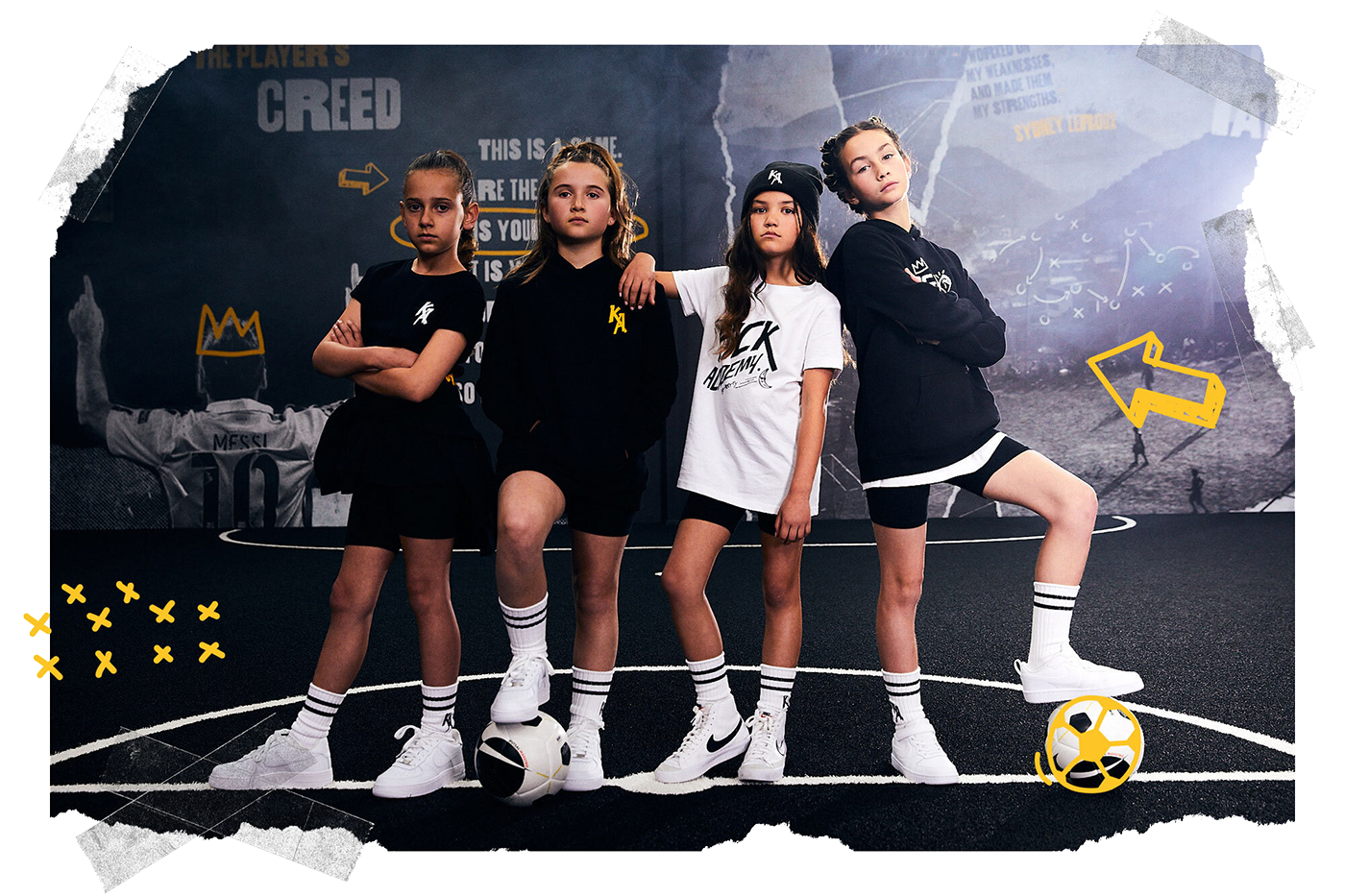 Fourgirlsposingforashotonanindoorsoccerpitch-crop